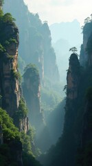 Majestic Landscape: Towering Sandstone Pillars with Lush Green Vegetation, Misty Valley