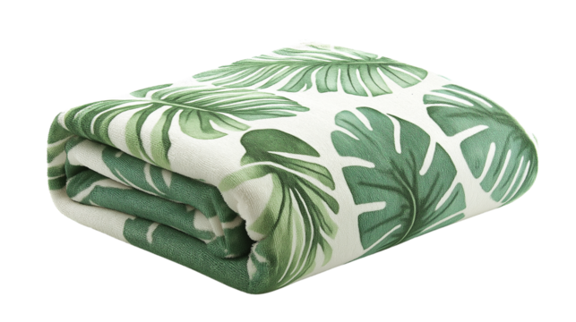 Neatly folded beach towel with tropical leaf print, soft fabric, isolated on white background, PNG format 