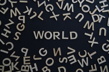 Scattered letters converge around a central word, symbolizing the chaos of public discourse,...