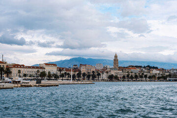 Naklejka premium Seaside cityscape of Split, Croatia with historic architecture and mountain background