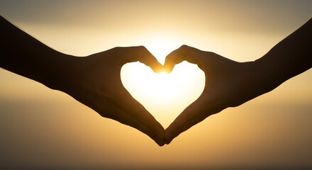 Fototapeta premium Heart hands silhouette against sunset backdrop symbolizing love and connection