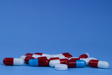 Photo of pills drugs  on background