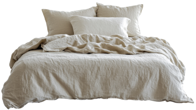 Unmade bed with beige linen sheets and pillows on transparent background