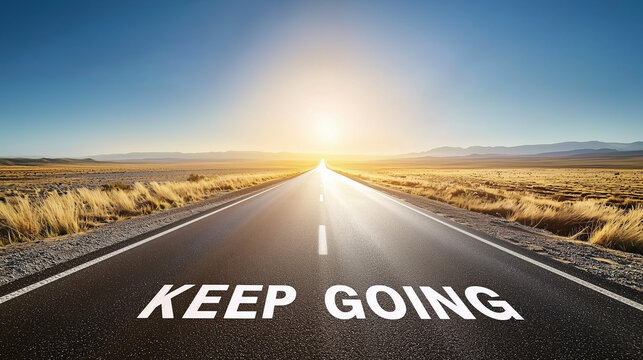 Road stretching into the horizon under a bright sun with motivational message