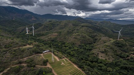 Lush Hills with Wind Turbines Under a Dramatic Cloudy Sky