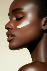 Woman applying cream to her skin
