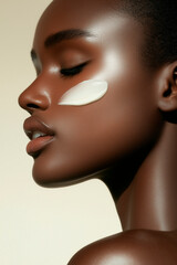 Woman applying cream to her skin
