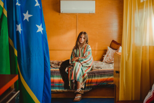 girl sitting in bed