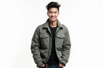 Fototapeta premium Half-Length (Waist-Up) portrait of young stylish smiling Burmese male model in punk wear isolated on pure white background looking at camera