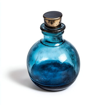 Magic potion bottle. Glass medieval ink bottle. Blue glass old bottle. Antique glass bottle filled with a deep blue liquid. Poison bottle. Witchcraft bottle. 