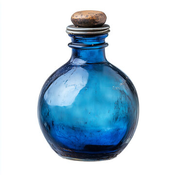 Magic potion bottle. Glass medieval ink bottle. Blue glass old bottle. Antique glass bottle filled with a deep blue liquid. Poison bottle. Witchcraft bottle. 