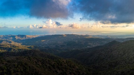 Aerial view of mountain landscape and coastline.