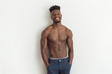 Fototapeta premium Half-Length (Waist-Up) portrait of young stylish smiling Cabo Verdean male model in sexy wear isolated on pure white background looking at camera