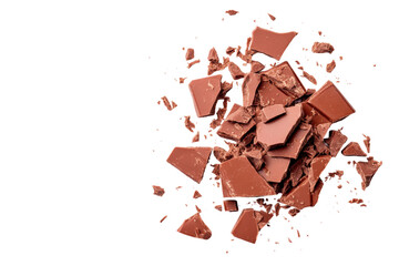 Chocolate pieces scattered on white surface, cut out