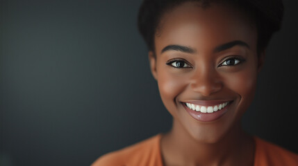 professional female closeup with a warm smile 