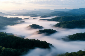 A high-resolution aerial view of rolling hills covered in early morning fog