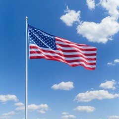 Fototapeta premium US flag waving, sunny sky, clouds. Patriotism, freedom