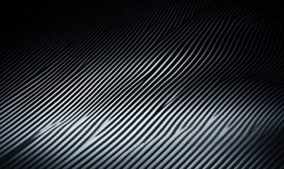 Dark carbon fiber background showing diagonal weave pattern 
