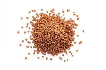 Top view of a pile of brown couscous grains isolated on white.