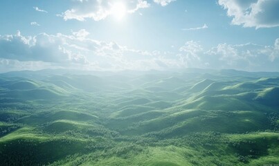 Naklejka premium Scenic aerial view of rolling green hills under a bright blue sky, soft natural light creating an expansive and tranquil rural landscape