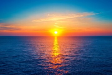 Fototapeta premium Aerial view of a stunning sunset over the ocean with waves and night sky, captured by drone