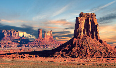 Monument valley, red rocks at sunrise in Arizona - Utah