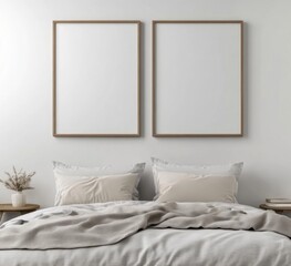 Two blank frames above minimalist bedroom.