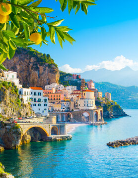 Beautiful view of Amalfi on the Mediterranean coast with lemons in the foreground, Italy