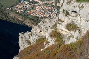 Panoramic view of rocky slope of Mount Nerone with natural arch Balza Forata, in the Apennines...