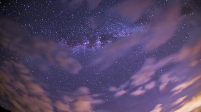 Starry night sky with milky way and glowing clouds, cosmic beauty concept