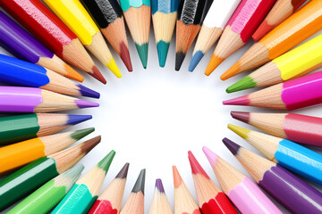 Fototapeta premium Vibrant Colored Pencils Arranged in Circle on White Background for Creative Projects