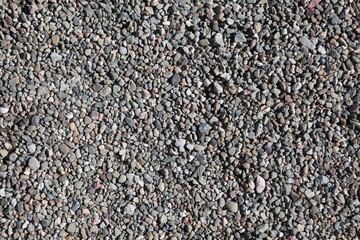 Pea gravel background texture, gray