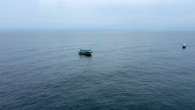 Aerial view over traditional wooden fishing boat at Java Sea Indonesia 
