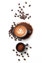 Top view of a cup of cappuccino with latte art, surrounded by roasted coffee beans and ground coffee in a black cup, isolated on white background, perfect for coffee-themed designs and advertising