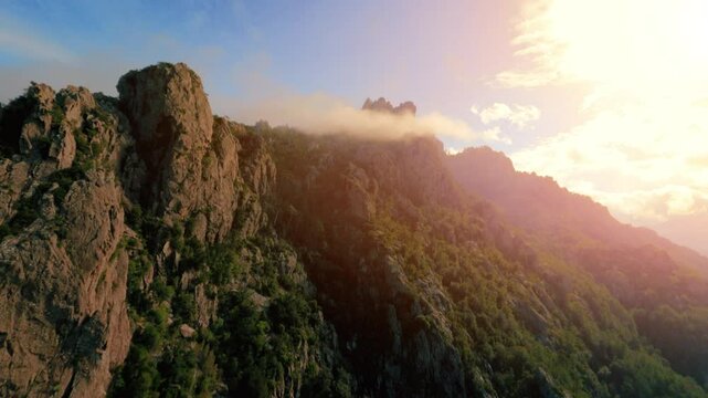 Exploring breathtaking Corsican mountain landscapes with FPV drone at sunset