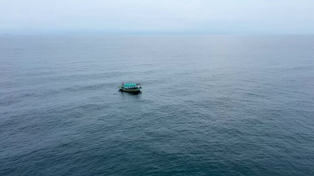 Aerial view over traditional wooden fishing boat at Java Sea Indonesia 