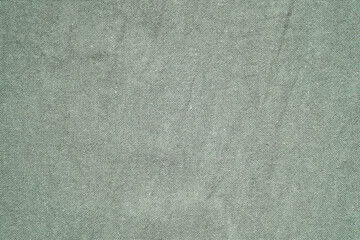 Green cotton fabric texture background, Canvas surface textile, wallpaper, banner