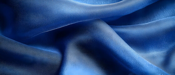 Blue silk fabric folds, texture background