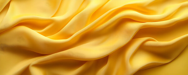 Obraz premium Yellow silk fabric texture background
