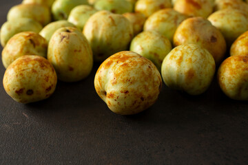 A view of a layer of jujube fruit, as a background.