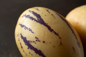 A closeup view of a pepino melon.
