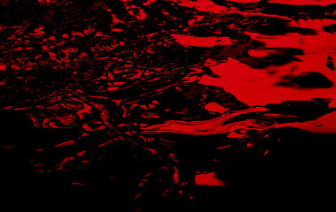 Black red abstract nature background, curving pattern. Blood red rippled surface. Nightmare, mysterious, dramatic style. Rough background with copy space for design.
