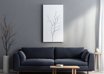 A simple yet elegant white vertical canvas with an outline of minimalist tree branches, displayed on the wall above a dark blue sofa in a Scandinavian-style living room