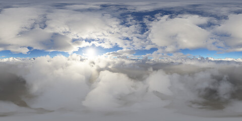 Obraz premium Majestic Clouds Over Mountain Peaks in a 360 View with Realistic Rendering