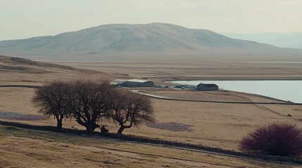 Obraz premium Rural lake landscape, tranquil scene, distant mountains, spring