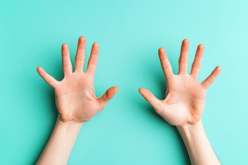 Two human hands are open and facing the viewer openly