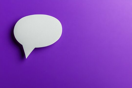 A blank white speech bubble sits on a vibrant purple background