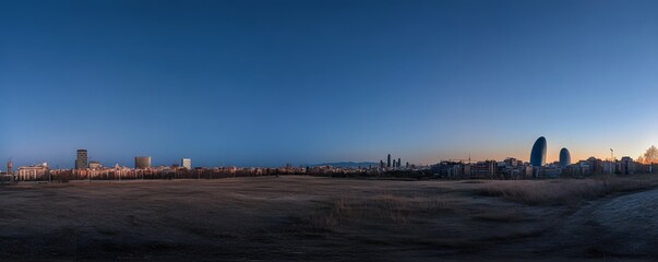 Panoramic view showcases the Barcelona skyline at early morning