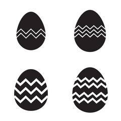 A black egg with a zigzag pattern in white easter day vibes