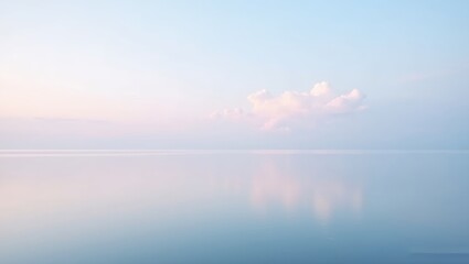 minimalist seascape photo of a peaceful ocean at daybreak sky is filled with soft pink to light blue pastel clouds clouds are reflected